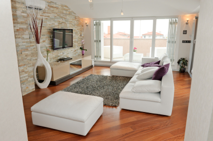 hardwood floor and stone living room